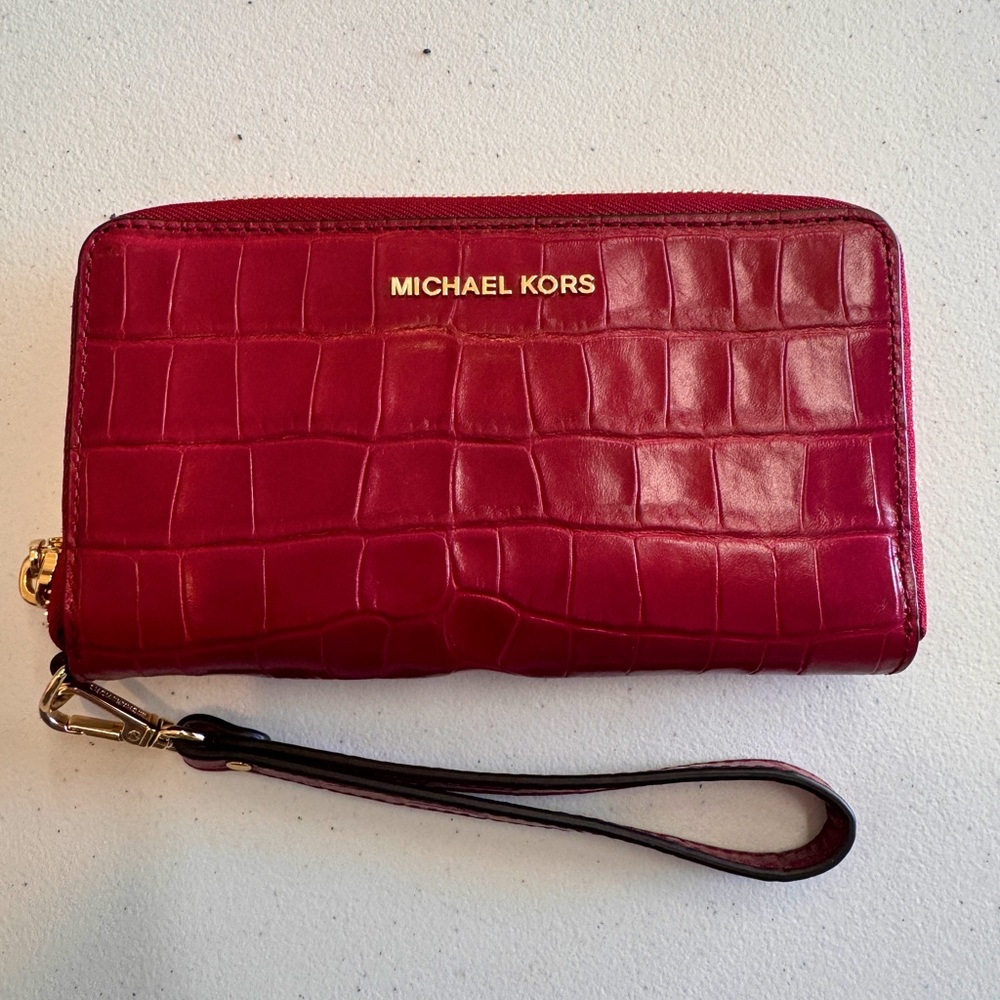 Michael Kors wristlet wallet, never used. Pocket inside for phone.